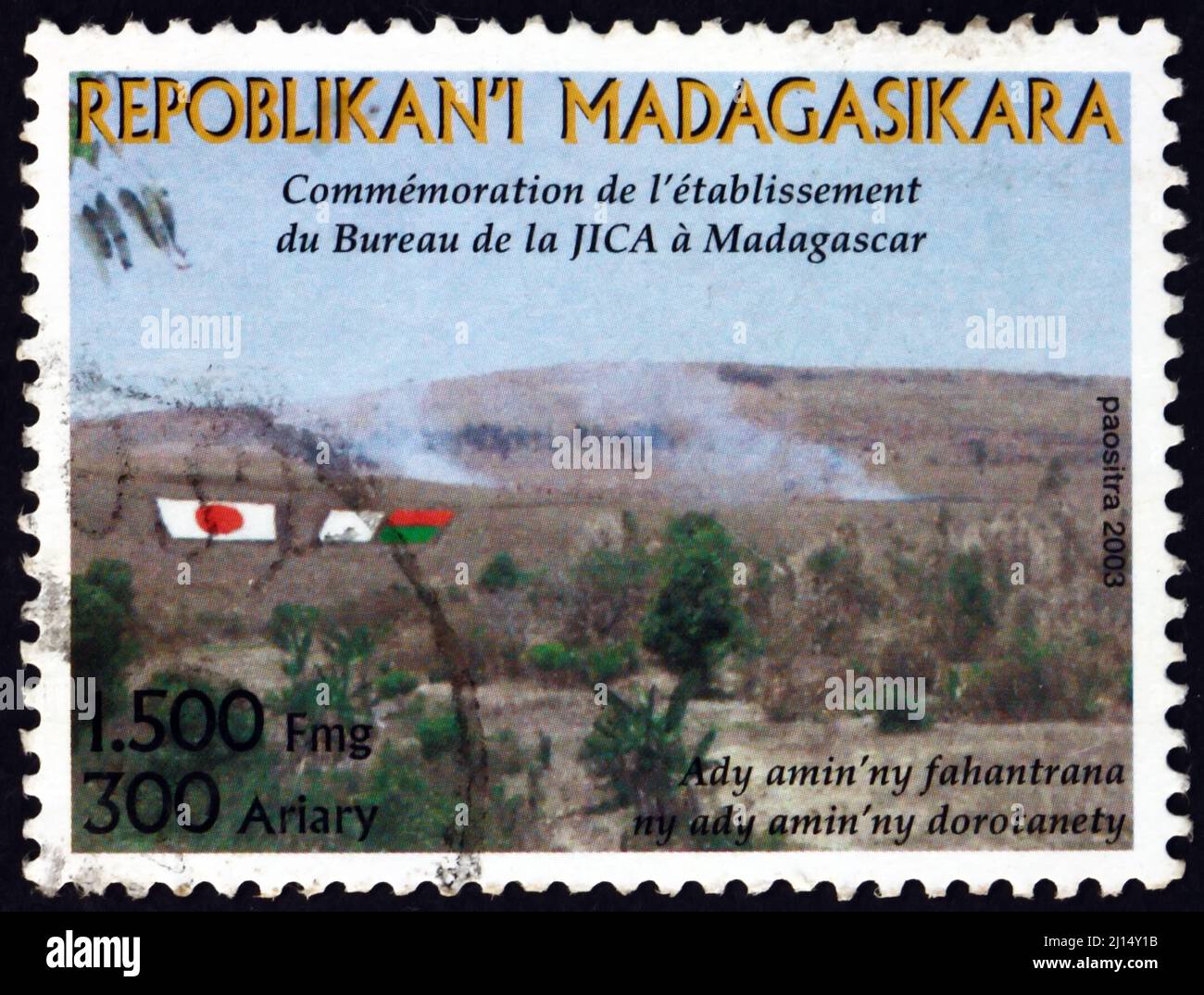 MALAGASY - CIRCA 2003: a stamp printed in Malagasy, Madagascar dedicated to establishment of Japan international cooperation agency bureau in Madagasc Stock Photo