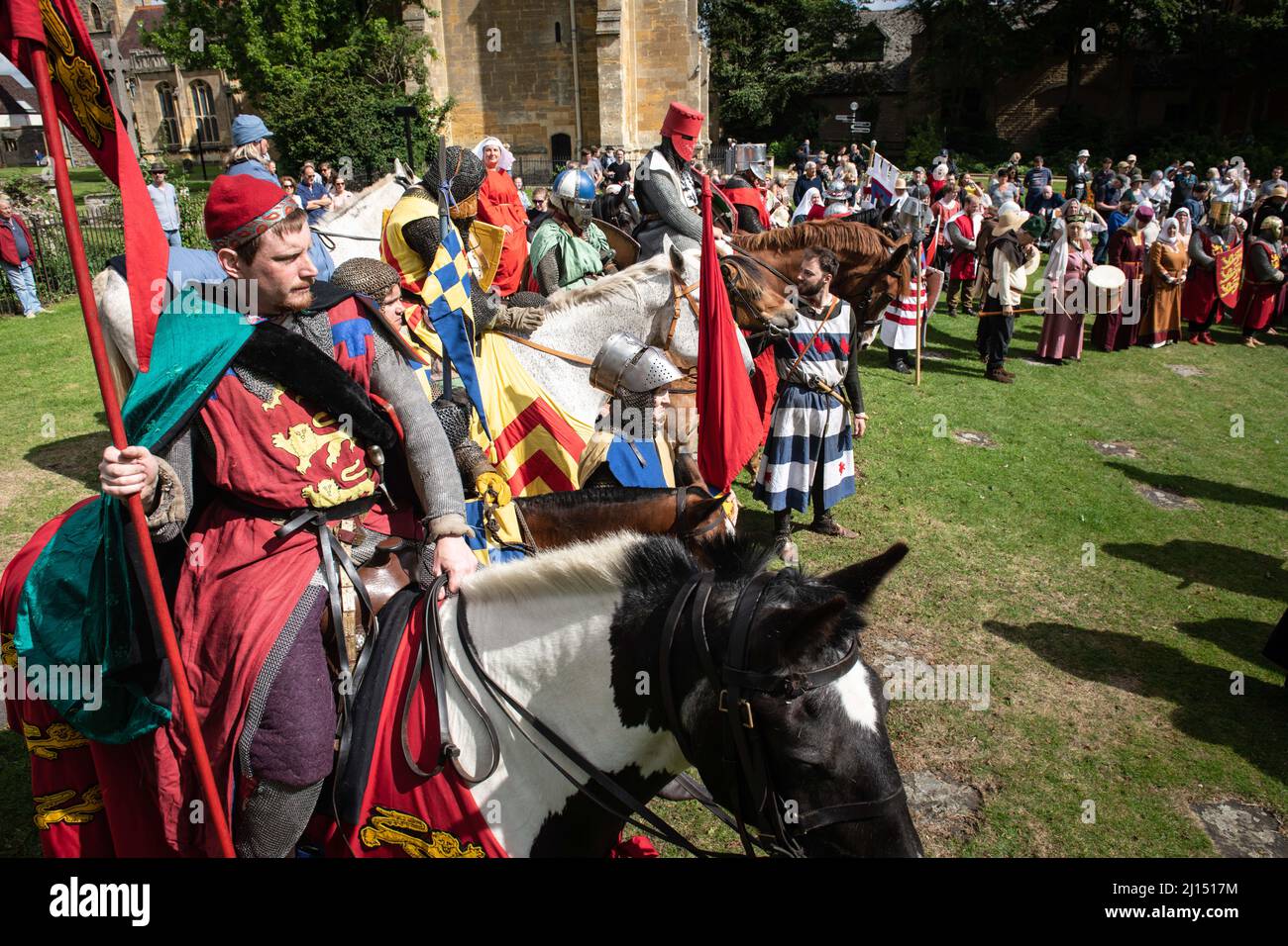 Evesham, Worcestershire, UK. 7th August, 2021. Pictured: Re-enactors pay their respects as a wreath is laid at Simon de Montford's memorial stone in A Stock Photo