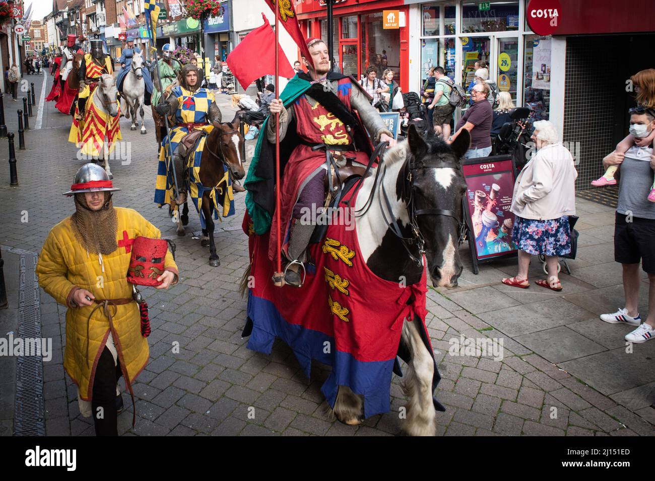 Evesham, Worcestershire, UK. 7th August, 2021. Pictured: Hundreds of spectators line Evesham's streets to watch the re-enactors' parade.  / More than Stock Photo