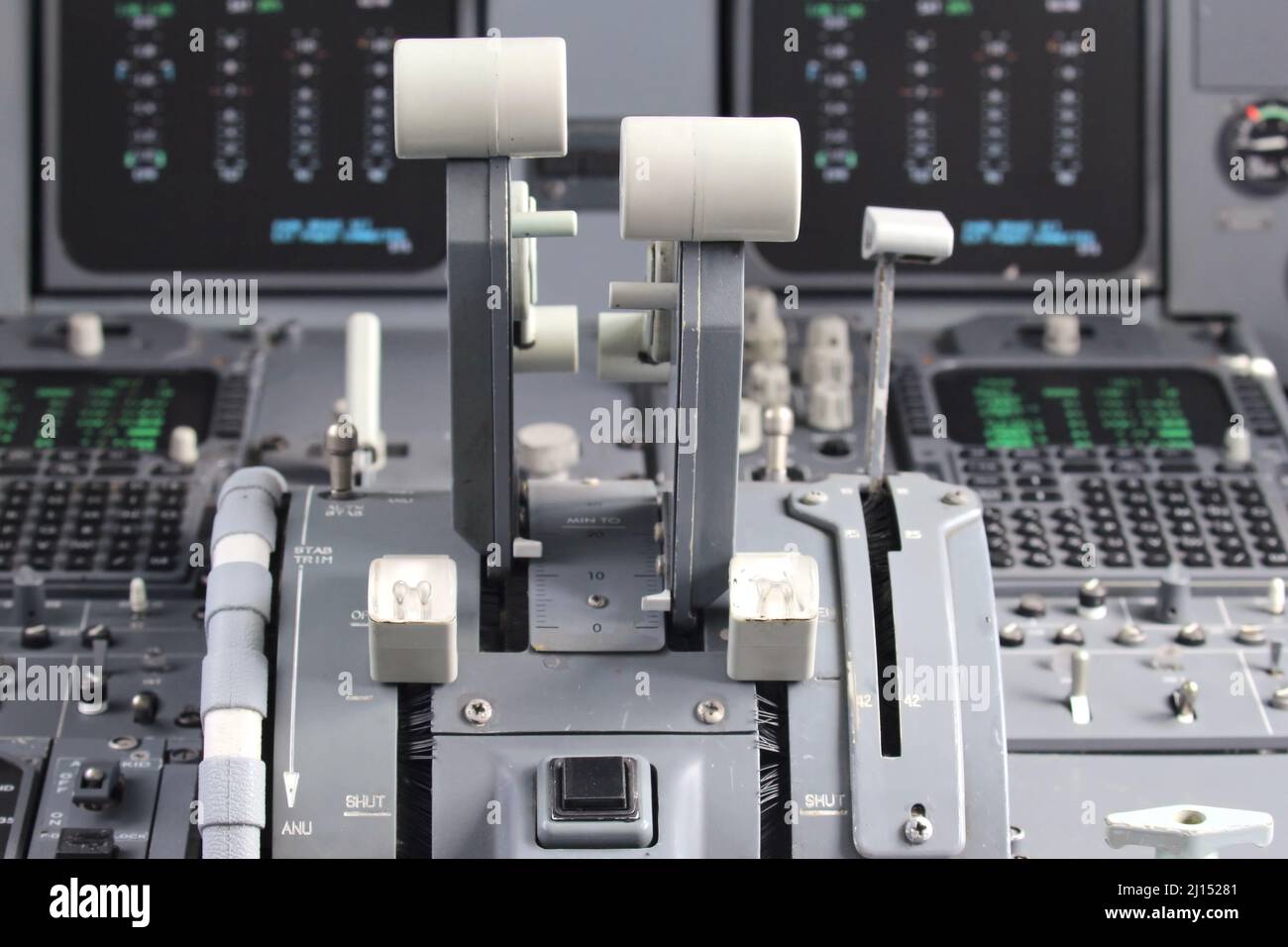 thrust levers of a twin engined airliner Stock Photo