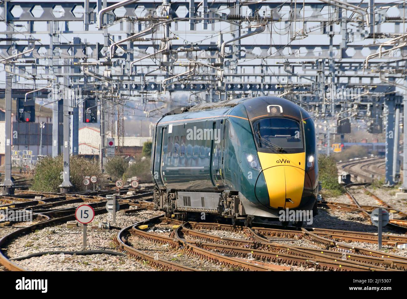Cardiff, Wales - March 2022: Class 800 high speed train operated by Great Western railway approaching Cardiff Central railway station under wires Stock Photo