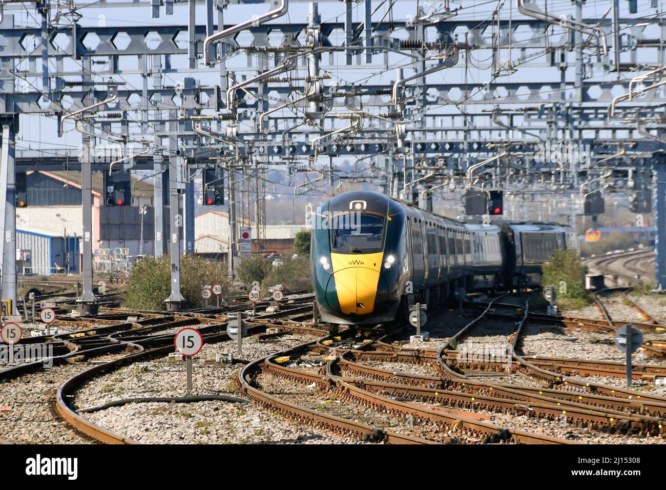Cardiff, Wales - March 2022: Class 800 high speed train operated by Great Western railway approaching Cardiff Central railway station under wires Stock Photo