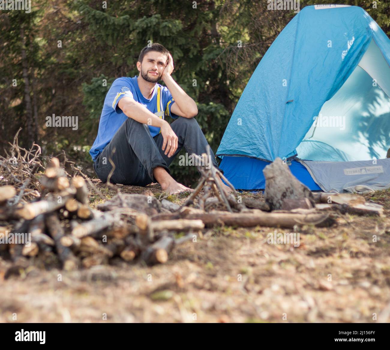 Bored at campsite in the wild Stock Photo
