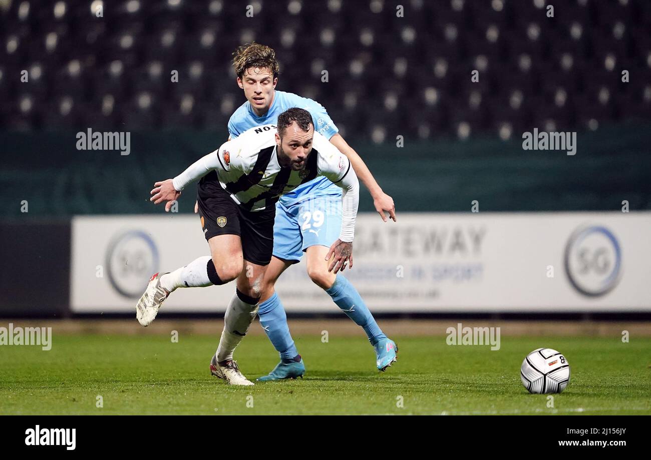 Notts County's Connell Rawlinson (left) and Boreham Wood's Danilo Orsi-Dadomo battle for the ball during the Vanarama National League match at Meadow Lane, Nottingham. Picture date: Tuesday March 22, 2022. Stock Photo