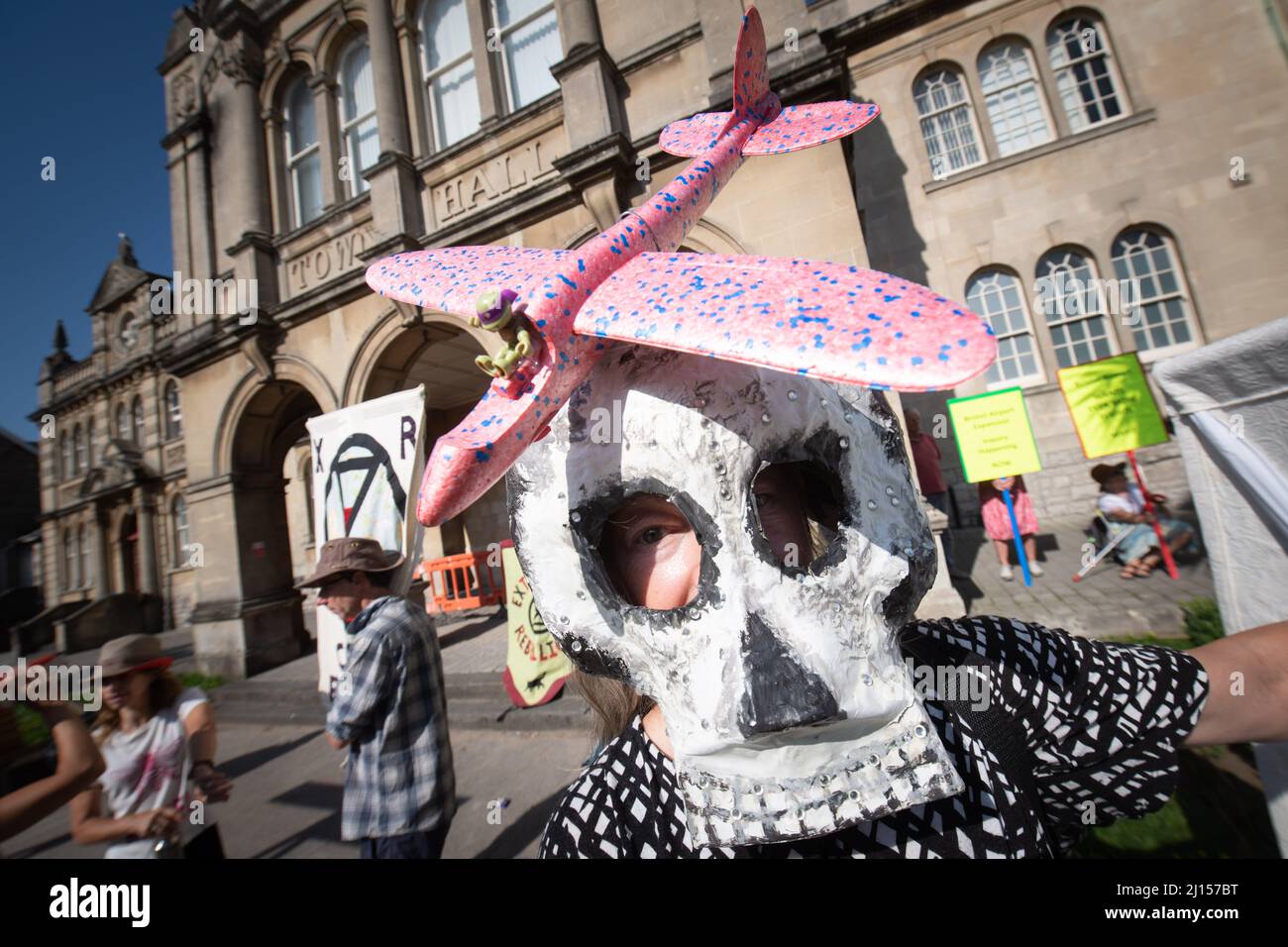 Weston-super-Mare, North Somerset, UK. 20th July 2021. Pictured: A protester wears a mask outside Weston-super-Mare Town Hall.  Regarded by some envir Stock Photo