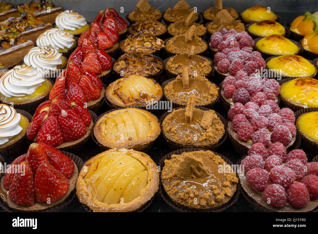 Tarlets Cake Artisan baker and pastry chef. Detail of mixed tartlets and cakes in a ...