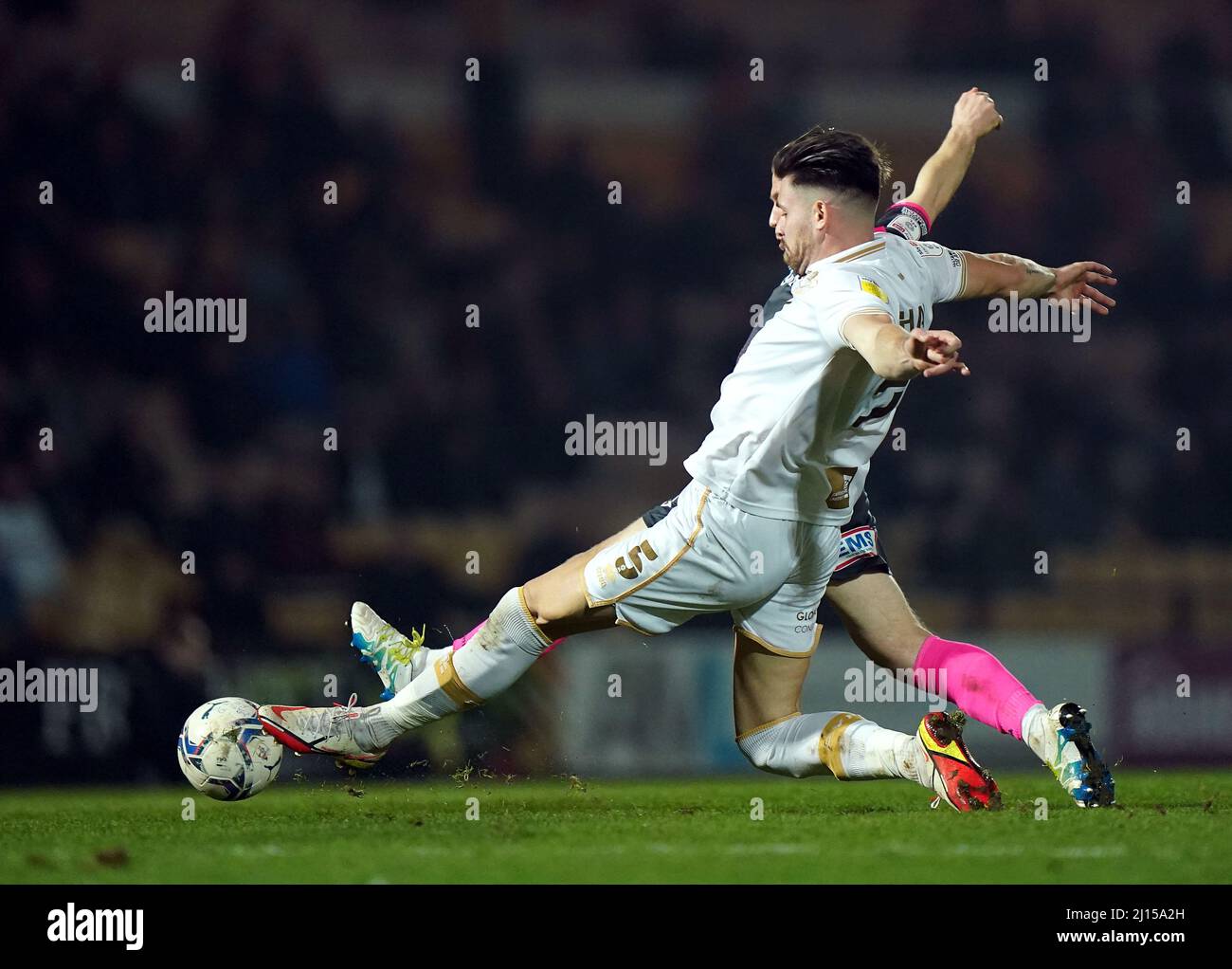 Port Vale's Connor Hal (left) and Exeter City's Matt Jay battle for the ball during the Sky Bet League Two match at Vale Park, Stoke-on-Trent. Picture date: Tuesday March 22, 2022. Stock Photo