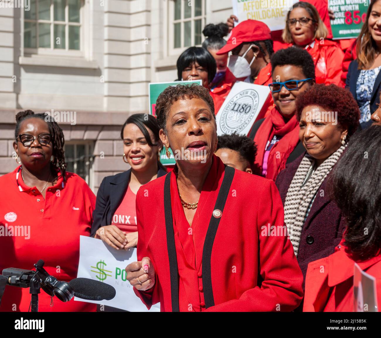 NY City Council Speaker Adrienne E. Adams, at podium,  joins activists, community leaders, union members and politicians on the steps of City Hall in New York on Tuesday, March 15, 2022 to rally against pay disparity on the 16th annual Equal Pay Day. Worldwide women on average earn 87 cents for every dollar her male counterpart earns with dramatic adjustments for women of color. (© Richard B. Levine) Stock Photo