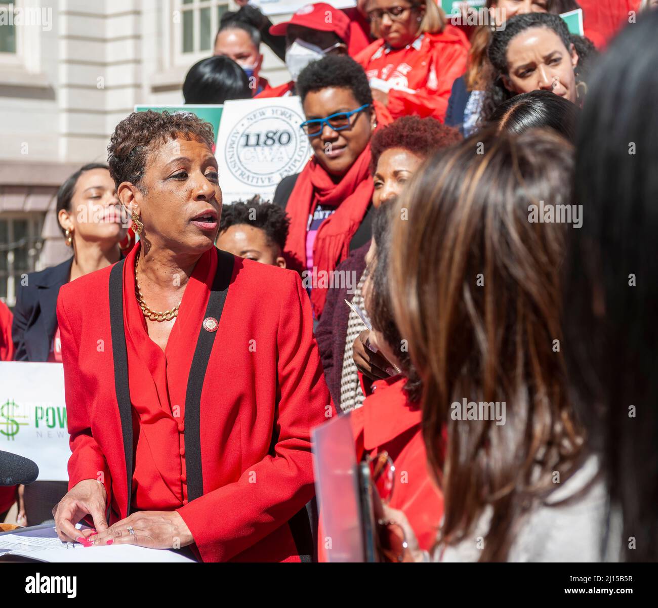 NY City Council Speaker Adrienne E. Adams, at podium,  joins activists, community leaders, union members and politicians on the steps of City Hall in New York on Tuesday, March 15, 2022 to rally against pay disparity on the 16th annual Equal Pay Day. Worldwide women on average earn 87 cents for every dollar her male counterpart earns with dramatic adjustments for women of color. (© Richard B. Levine) Stock Photo