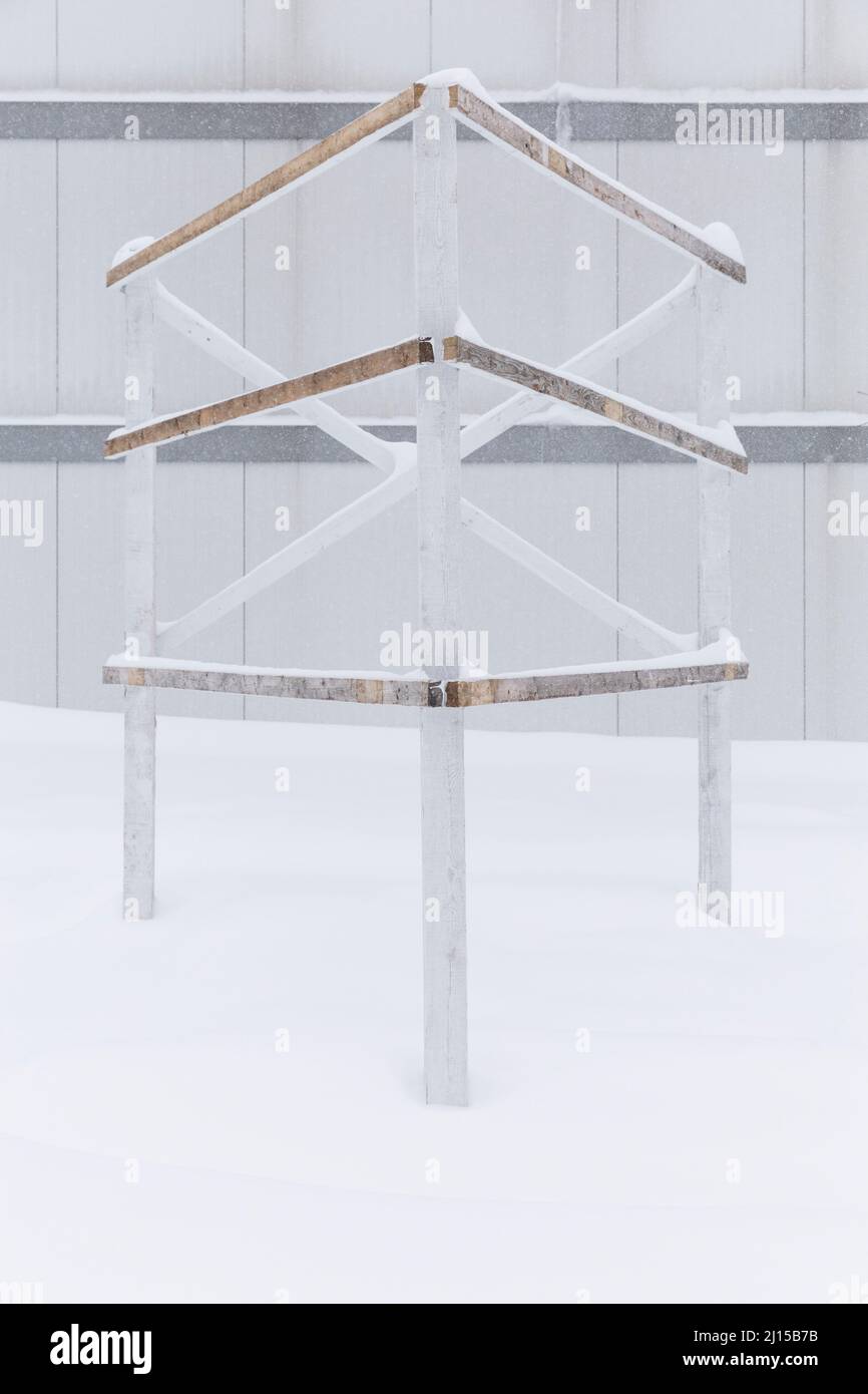 An empty framework in the snow outside a building in Longueuil, Quebec