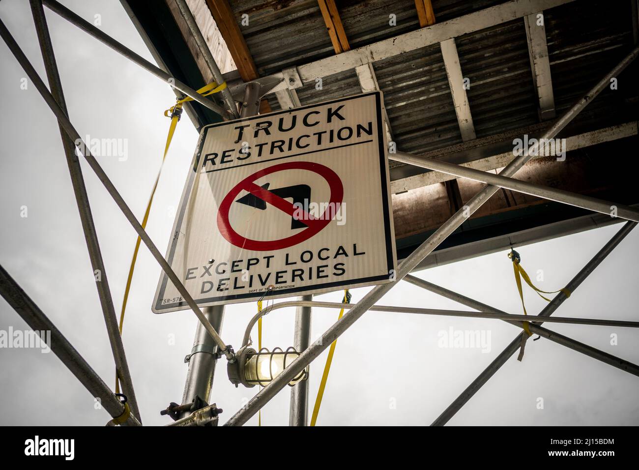 Traffic sign restricting left turns for trucks on the Bowery in New York on Saturday, March 12, 2022.  (© Richard B. Levine) Stock Photo
