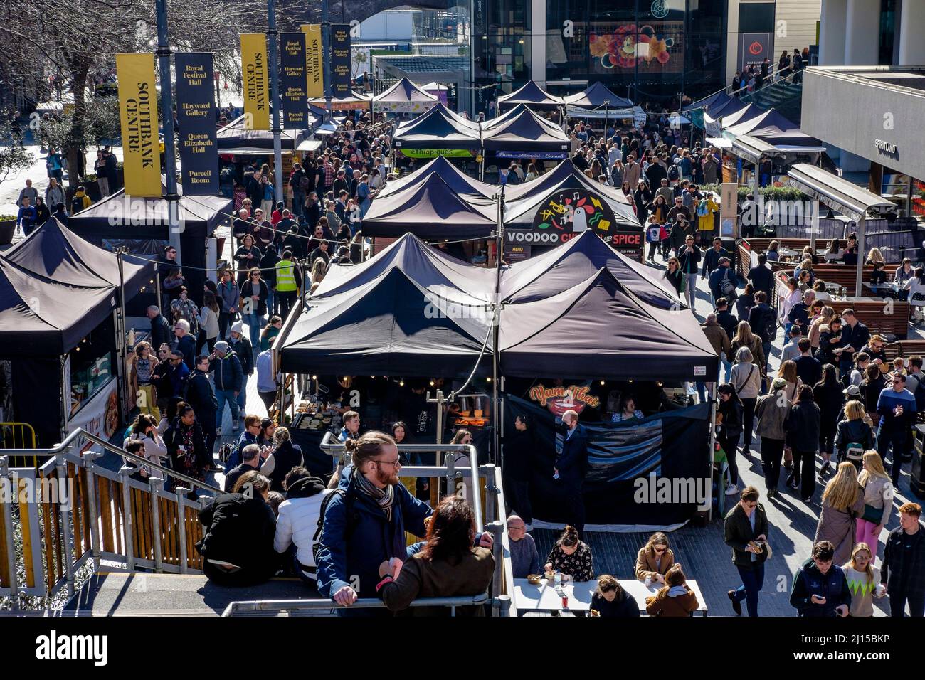 Visitors to the Southbank Centre Food Market enjoy a selection of international street food in