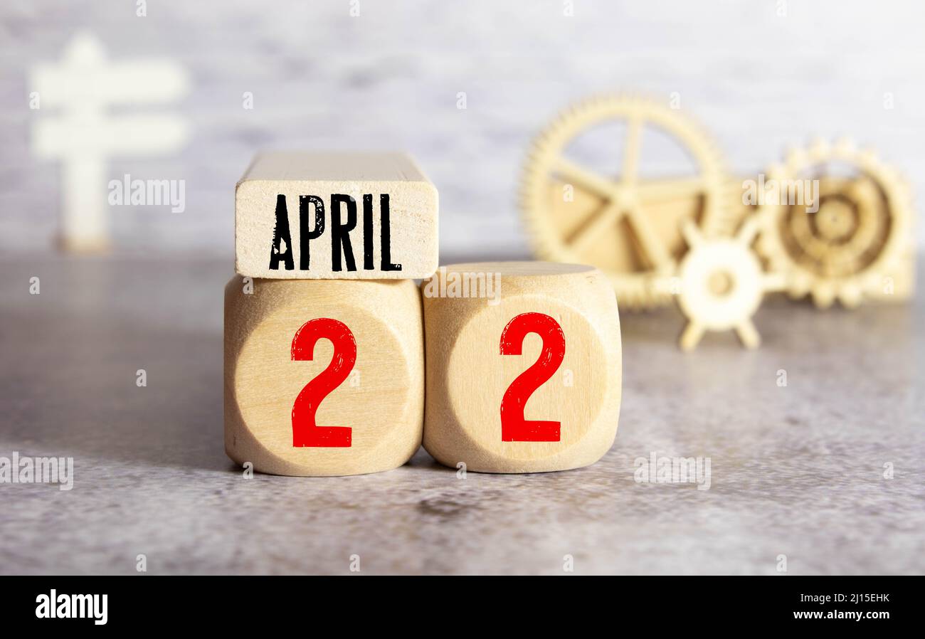 April 22nd. Earth Day. Image of april 22 wooden color calendar on white