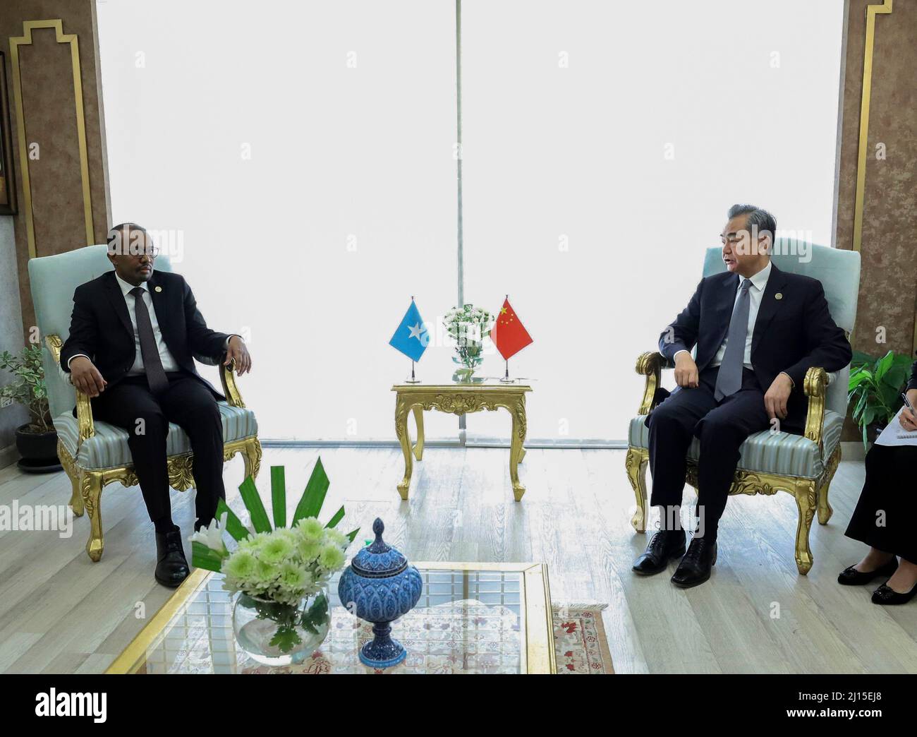 Islamabad, Pakistan. 22nd Mar, 2022. Chinese State Councilor and Foreign Minister Wang Yi (R) meets with Somali Foreign Minister Abdisaid Muse Ali in Islamabad, capital of Pakistan, on March 22, 2022. Credit: Jiang Chao/Xinhua/Alamy Live News Stock Photo