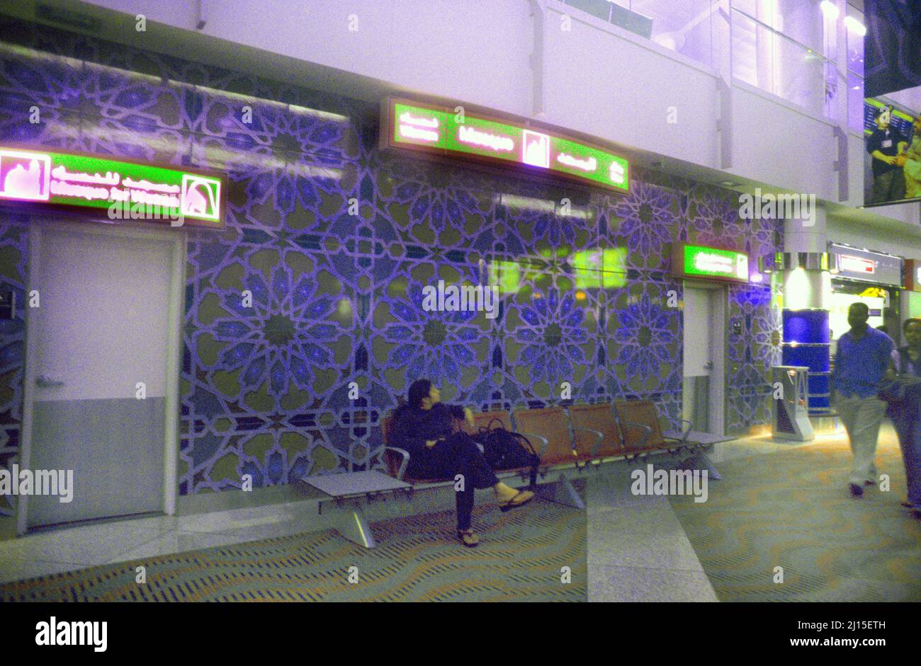 Dubai UAE Woman Sitting on Bench Outside Mosque In Airport Stock Photo ...