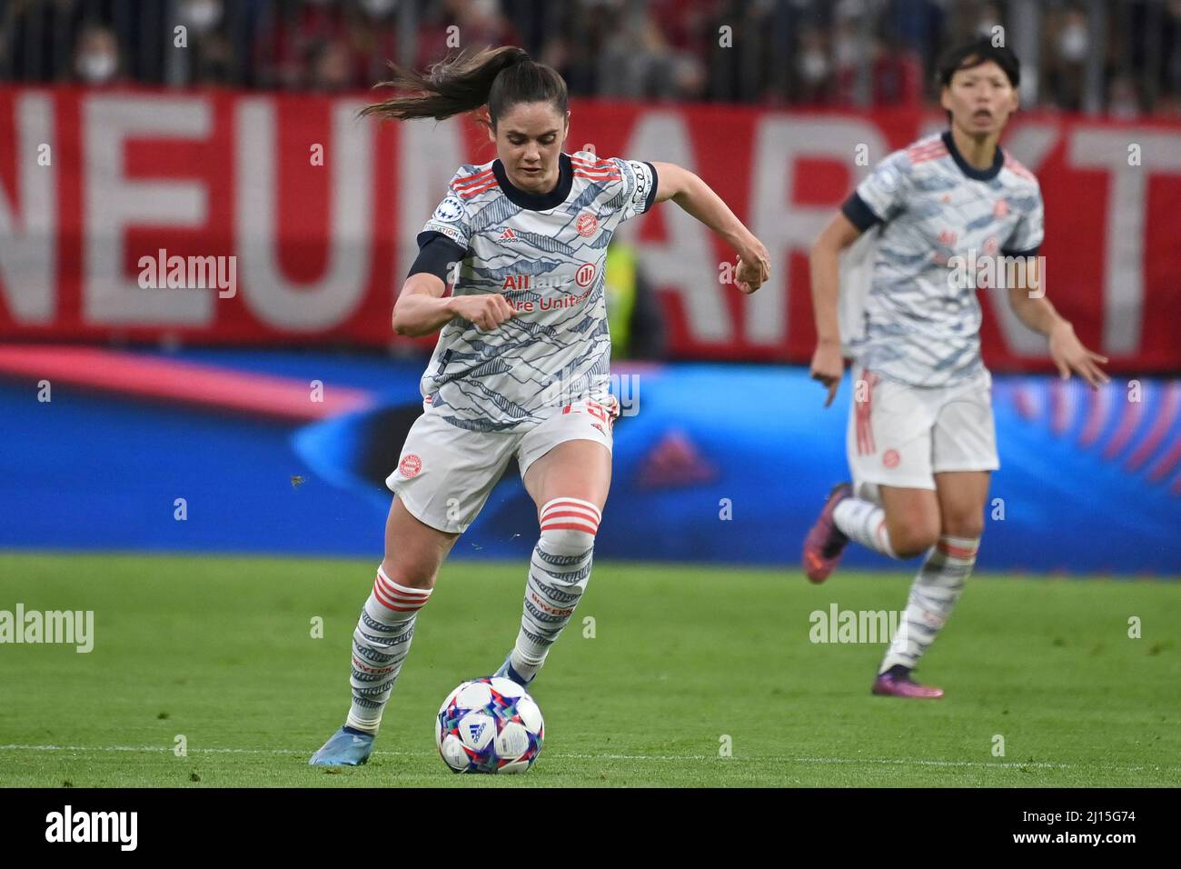 Bayern's Giulia Gwinn heads the ball during the women's quarterfinal Champions  League first leg soccer match between Bayern Munich and Paris Saint-Germain  in Munich, Germany, Tuesday, March 22, 2022. (AP Photo/Matthias Schrader