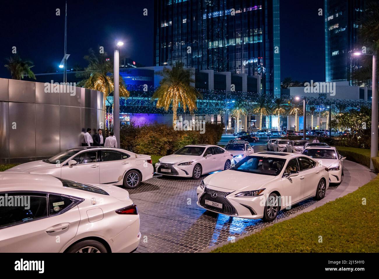 Luxury cars on illuminated Sheikh Mohammed Bin Rashid Boulevard Stock Photo