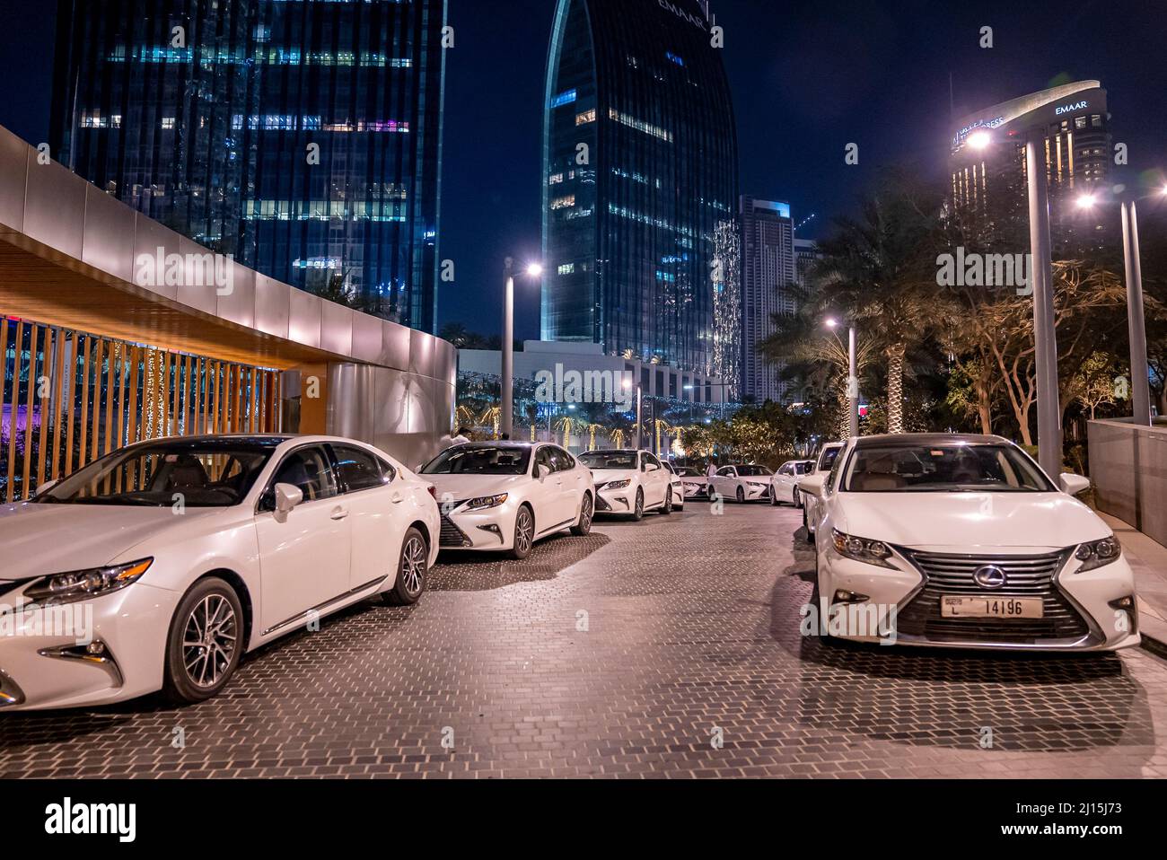Luxury cars on illuminated Sheikh Mohammed Bin Rashid Boulevard Stock Photo