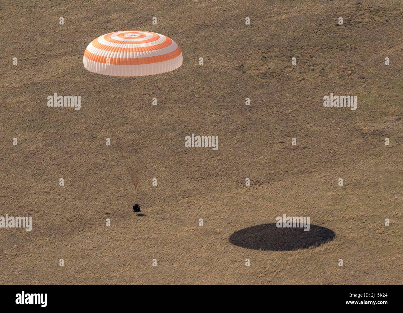 The Soyuz MS-17 spacecraft is seen as it lands in a remote area near the town of Zhezkazgan, Kazakhstan with Expedition 64 crew members Kate Rubins of NASA, Sergey Ryzhikov and Sergey Kud-Sverchkov of Roscosmos, Saturday, April 17, 2021. Rubins, Ryzhikov and Kud-Sverchkov returned after 185 days in space having served as Expedition 63-64 crew members onboard the International Space Station. Photo Credit: NASA/Bill Ingalls Stock Photo