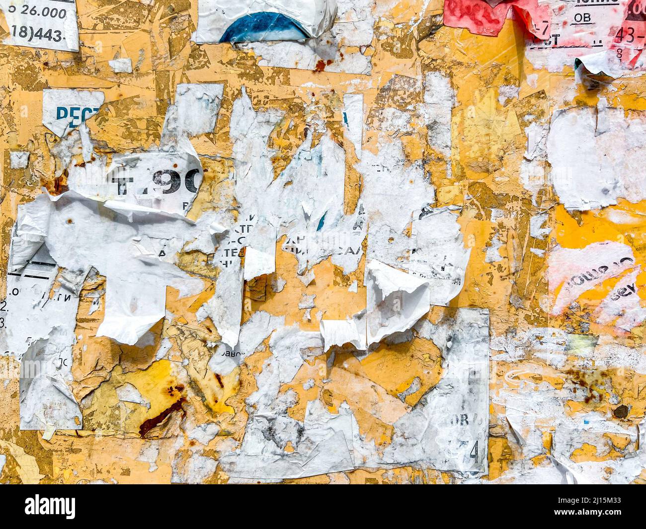 Outdoor Bulletin Board Or Plywood Panel With Worn Advertising Message