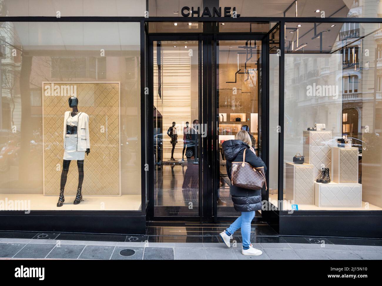 Madrid, Spain. 3rd Mar, 2022. A pedestrian walks past the French  multinational Chanel clothing and beauty products brand store in Spain.  (Credit Image: © Xavi Lopez/SOPA Images via ZUMA Press Wire Stock