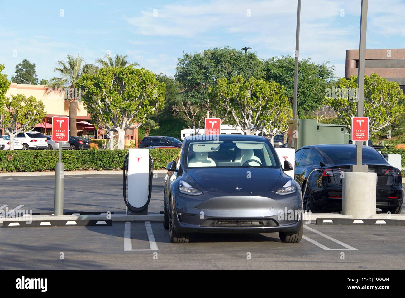 Anaheim Hills, CA - Jan 26, 2022: Tesla supercharging station located in a Target parking lot. Tesla Supercharger stations allow Tesla cars to be fast Stock Photo