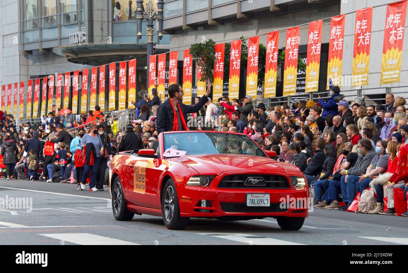 San Francisco, CA - Feb 19, 2022: Senator Scott Wiener in the Chinese New Year Parade, one of the world's top 10 parades and the largest celebration o Stock Photo