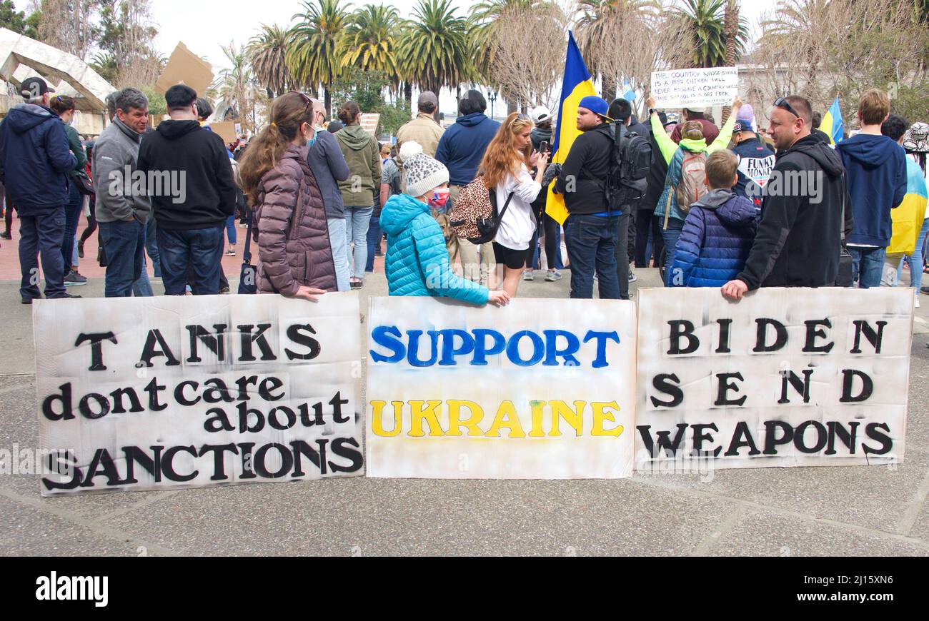 San Francisco, CA - Feb 26, 2022:  Unidentified participants at United We Stand For Ukraine Protest holding signs. Advocating for solidarity with the Stock Photo