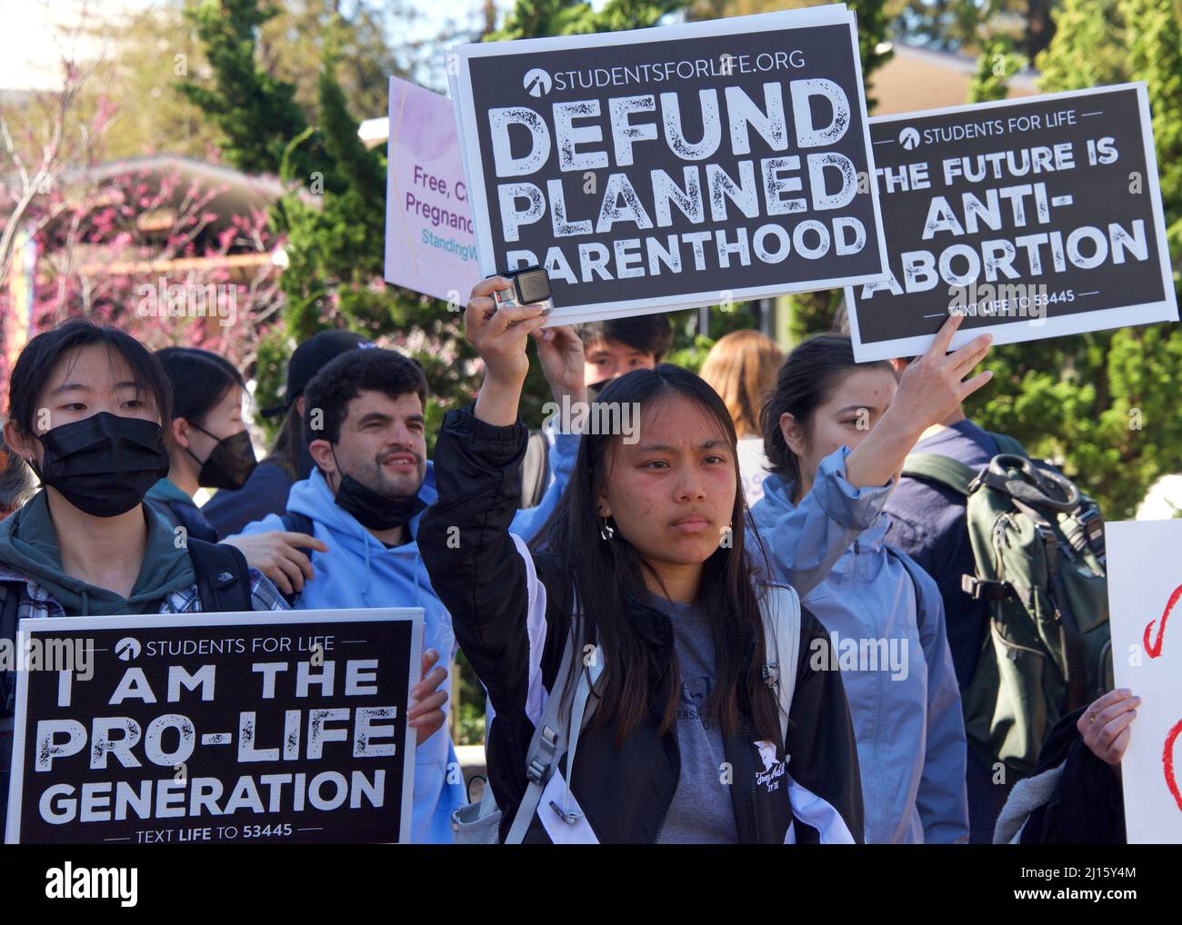 Berkeley, CA - March 8, 2022: Unidentified counter-protestors at the Rise Up 4 Abortion Rights protest in Sproul Plaza at UC Berkeley, CA. Stock Photo