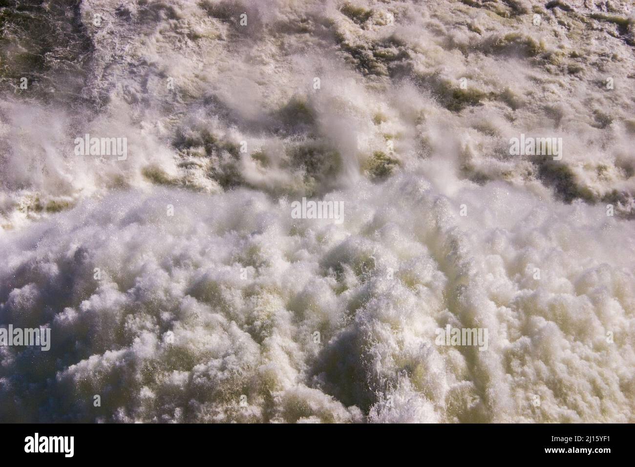 Close up of roaring water gushing from pressure outlet at Lake Hume dam Stock Photo