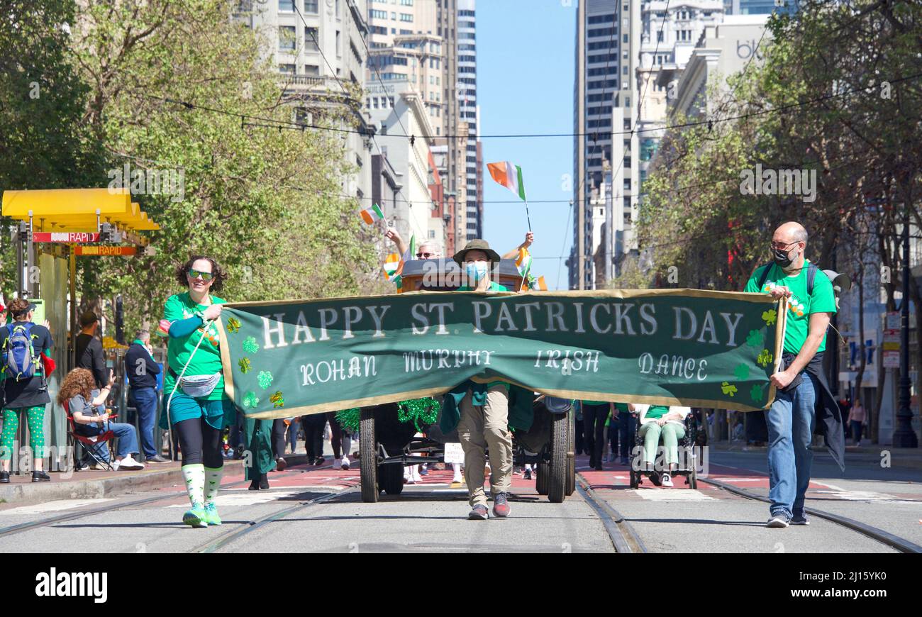 San Francisco, CA - March 12, 2022: Unidentified participants in the 2022 Saint Patrick's Day Parade, the West Coast's largest Irish event celebrating Stock Photo