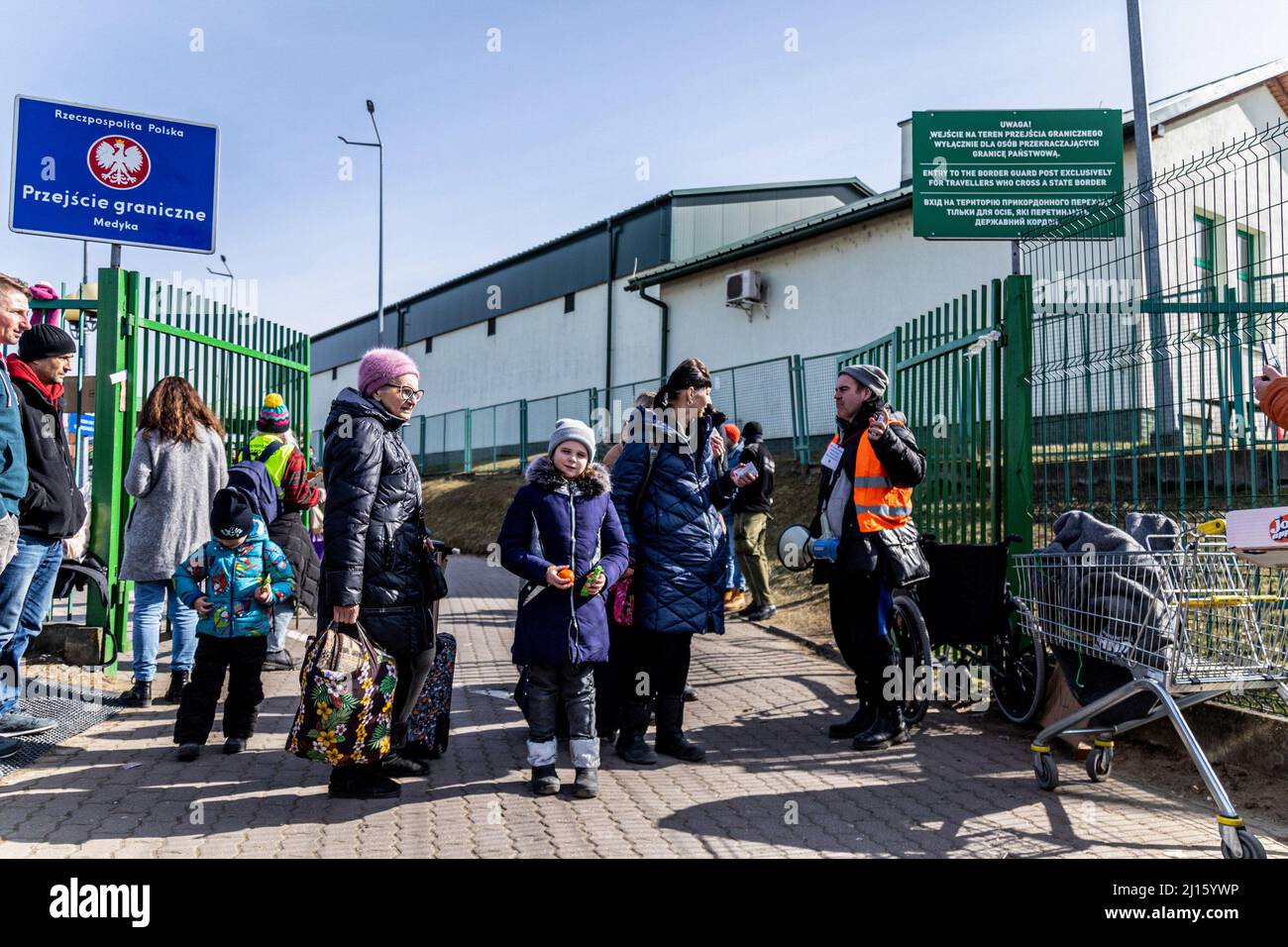 Medyka, Poland. 12th Mar, 2022. Ukrainian refugees cross into Medyka, Poland from Ukraine. Since the war started, more than 3 million people have fled the country. (Photo by Nicholas Muller/SOPA Images/Sipa USA) Credit: Sipa USA/Alamy Live News Stock Photo