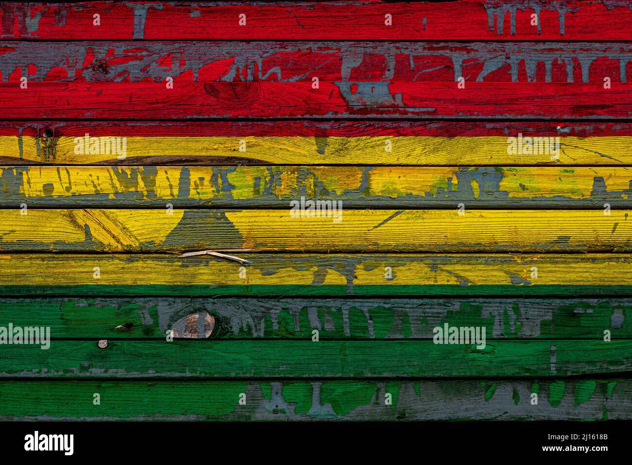 The national flag of Bolivia is painted on uneven boards. Country ...