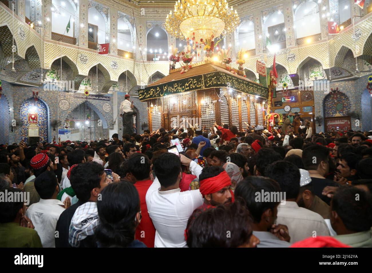 Sehwan, Pakistan. 21st Mar, 2022. A large number of devotees gather near the shrine of Hazrat Lal Shabaz Qalandar RA at sehwan city during the 770 Urs celebration (Photo by Jan Ali Laghari/Pacific Press) Credit: Pacific Press Media Production Corp./Alamy Live News Stock Photo