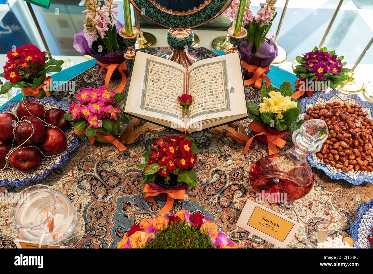 New York, New York, USA. 22nd Mar, 2022. United Nations celebration of Nowruz - Persian New Year at New York Headquarters. Missions of Afghanistan, India, Iran, Uzbekistan, Azerbaijan, Turkmenistan, Iraq, Kyrgystan, Pakistan, Tajikistan, Kazakhstan, Turkey set up Haft-sin table with all traditional items such as Quran, mirror, candles, painted eggs, a bowl of water with goldfish, coins, hyacinth flowers, and food. (Credit Image: © Lev Radin/Pacific Press via ZUMA Press Wire) Stock Photo