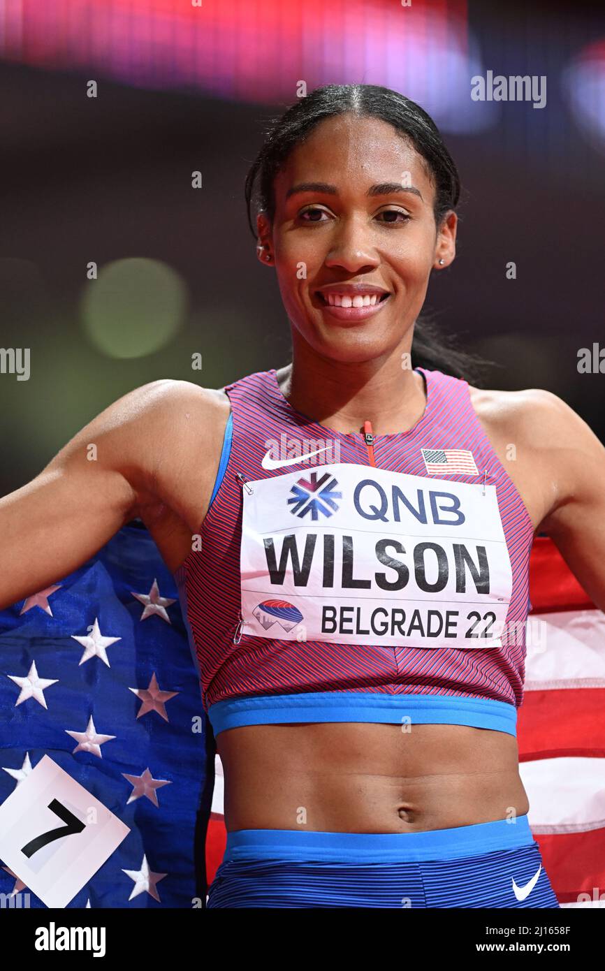 Ajee Wilson celebrating her victory with her flag at the Belgrade 2022 ...