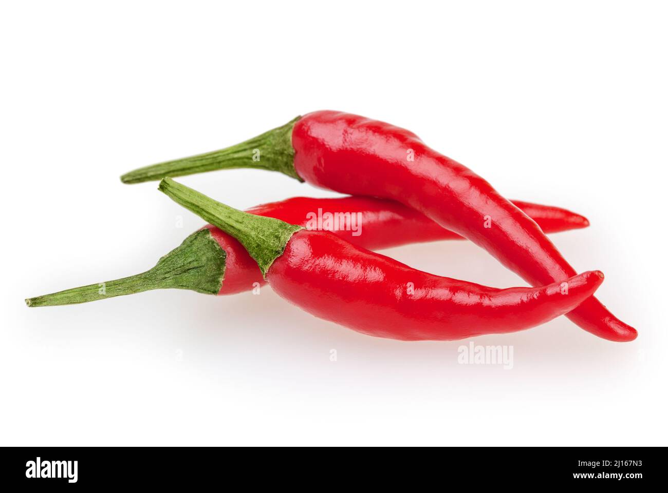 Three chili pepper isolated on white background Stock Photo - Alamy