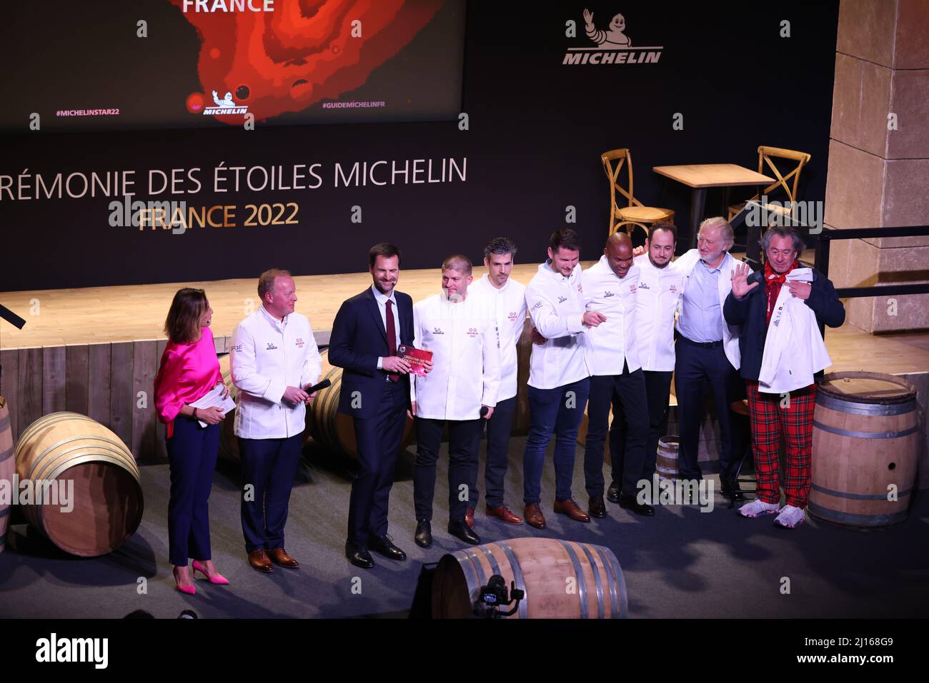 Cognac, France. 22nd Mar, 2022. Chefs celebrate after being awarded a second Michelin star during the 2022 edition of the Michelin Guide award ceremony in Cognac, France, March 22, 2022. The Michelin Guide launched its 2022 edition on Tuesday in Cognac, the first time in its 122 years the ceremony has taken place outside Paris. Two restaurants were awarded the highest distinction of three stars. Credit: Gao Jing/Xinhua/Alamy Live News Stock Photo