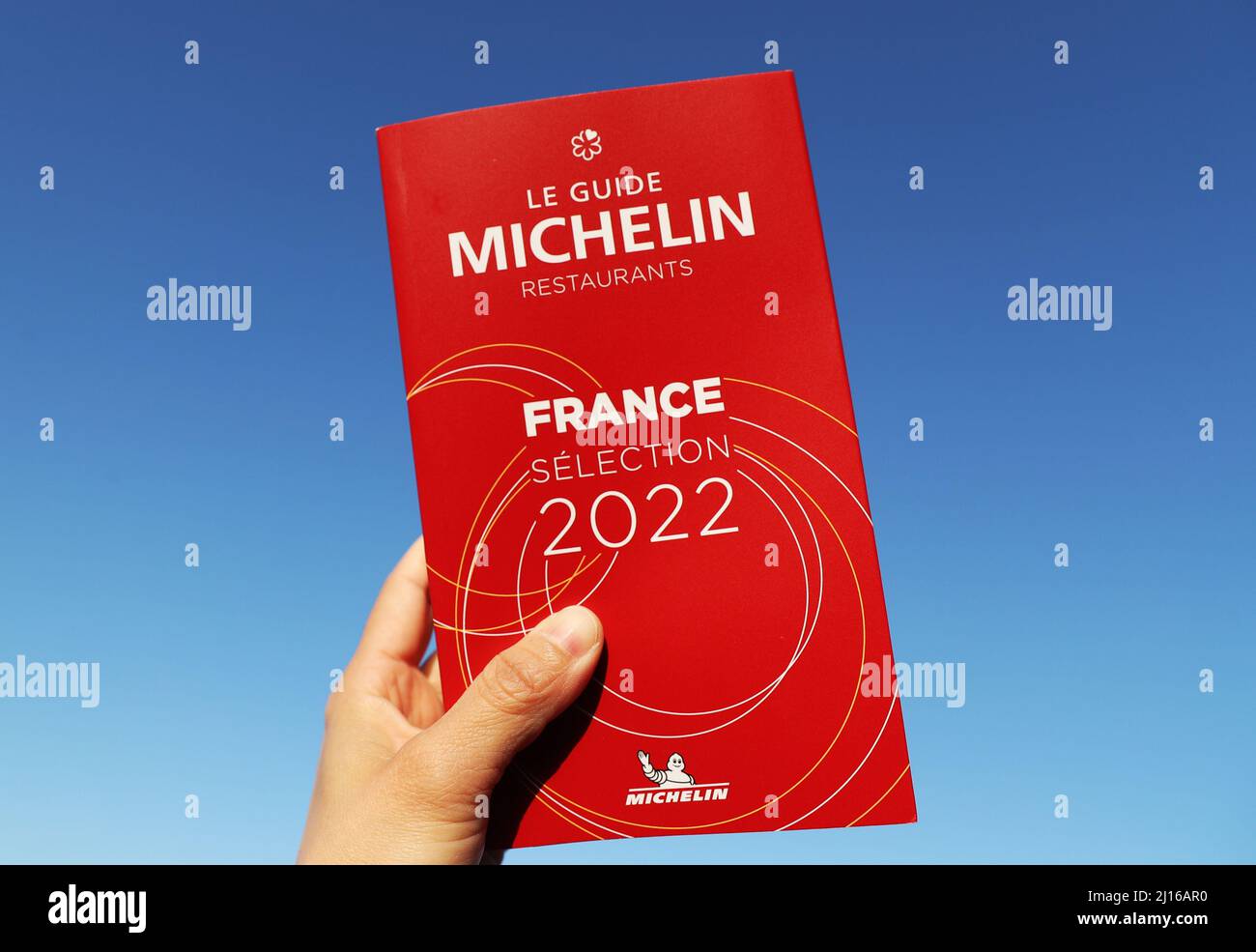 Cognac, France. 23rd Mar, 2022. A Michelin Guide France 2022 is pictured in Cognac, France, March 23, 2022. The Michelin Guide launched its 2022 edition on Tuesday in Cognac, the first time in its 122 years the ceremony has taken place outside Paris. Two restaurants were awarded the highest distinction of three stars. Credit: Gao Jing/Xinhua/Alamy Live News Stock Photo