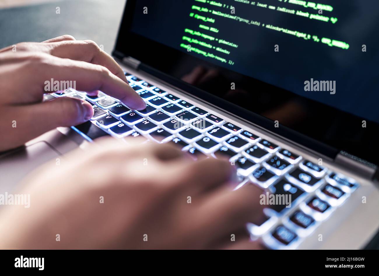 Hacker code in laptop. Cyber security, privacy or hack threat. Coder or programmer writing virus software, malware, internet attack. Stock Photo