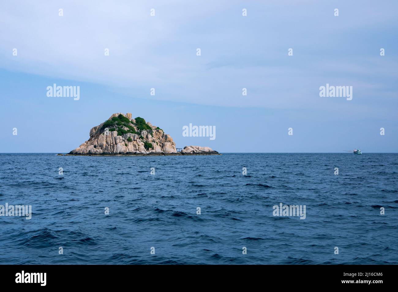 rock island and deep blue sea at thailand gulf Stock Photo