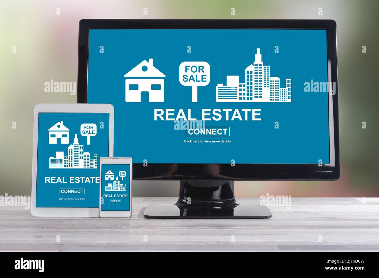 Real estate concept shown on different information technology devices Stock Photo
