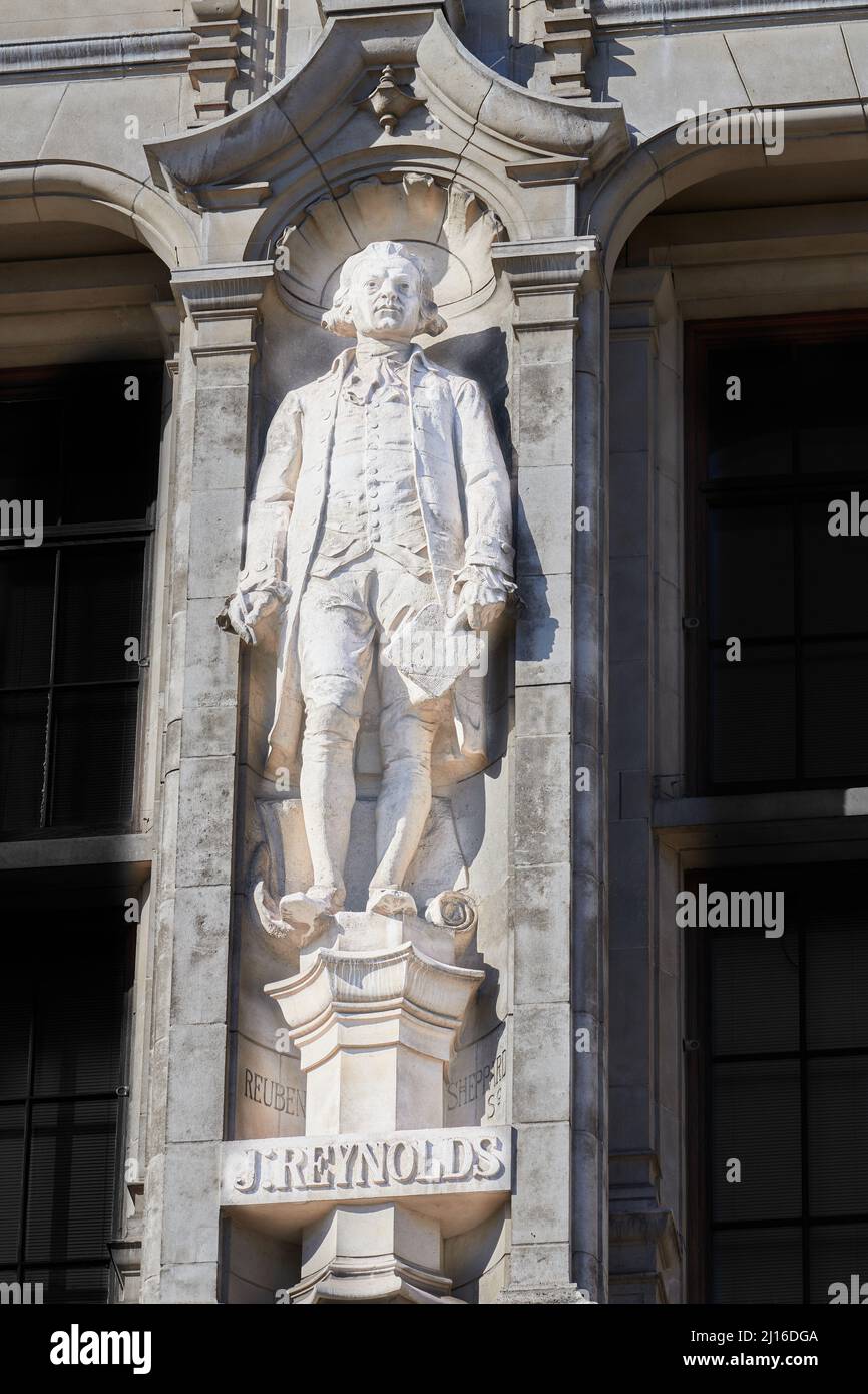 Statue of Joshua Reynolds on the front wall of the Victoria and Albert museum, London, England. Stock Photo