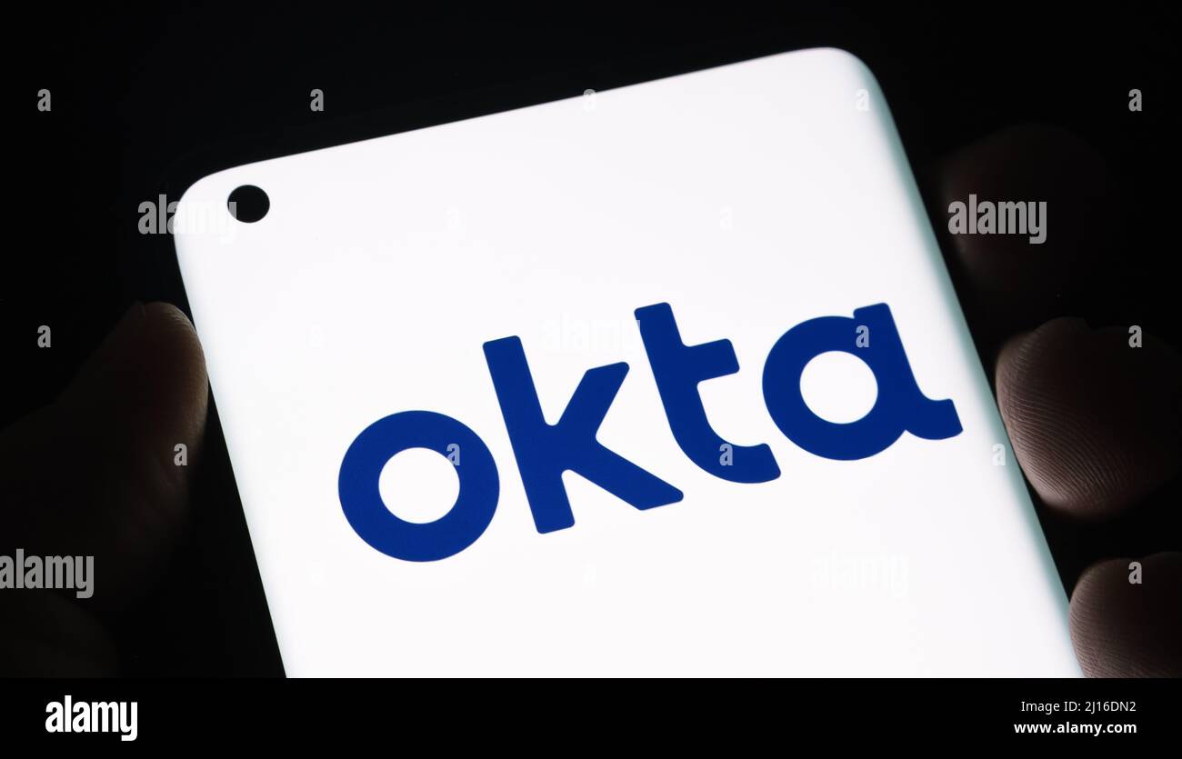 Okta security firm logo seen on smartphone. Concept for hack. Stafford, United Kingdom, March 22, 2022. Stock Photo