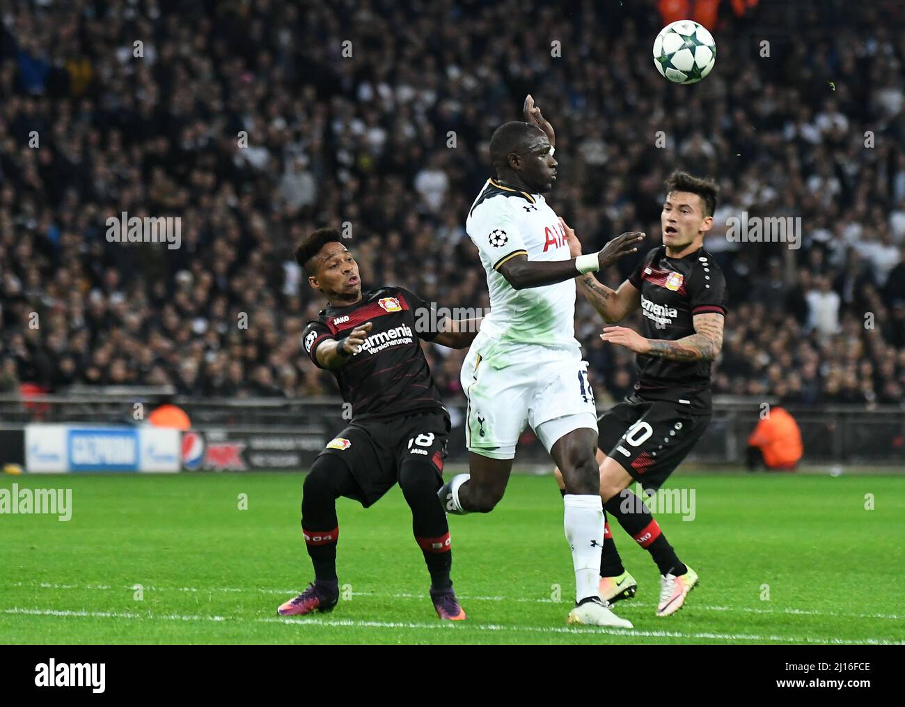 LONDON, ENGLAND - NOVEMBER 2, 2016: Wendell (L) and Charles Aranguiz (R) of Leverkusen and Moussa Sissoko (C) of Tottenham pictured in action during the UEFA Champions League Group E game between Tottenham Hotspur and Bayern Leverkusen at Wembley Stadium. Copyright: Cosmin Iftode/Picstaff Stock Photo