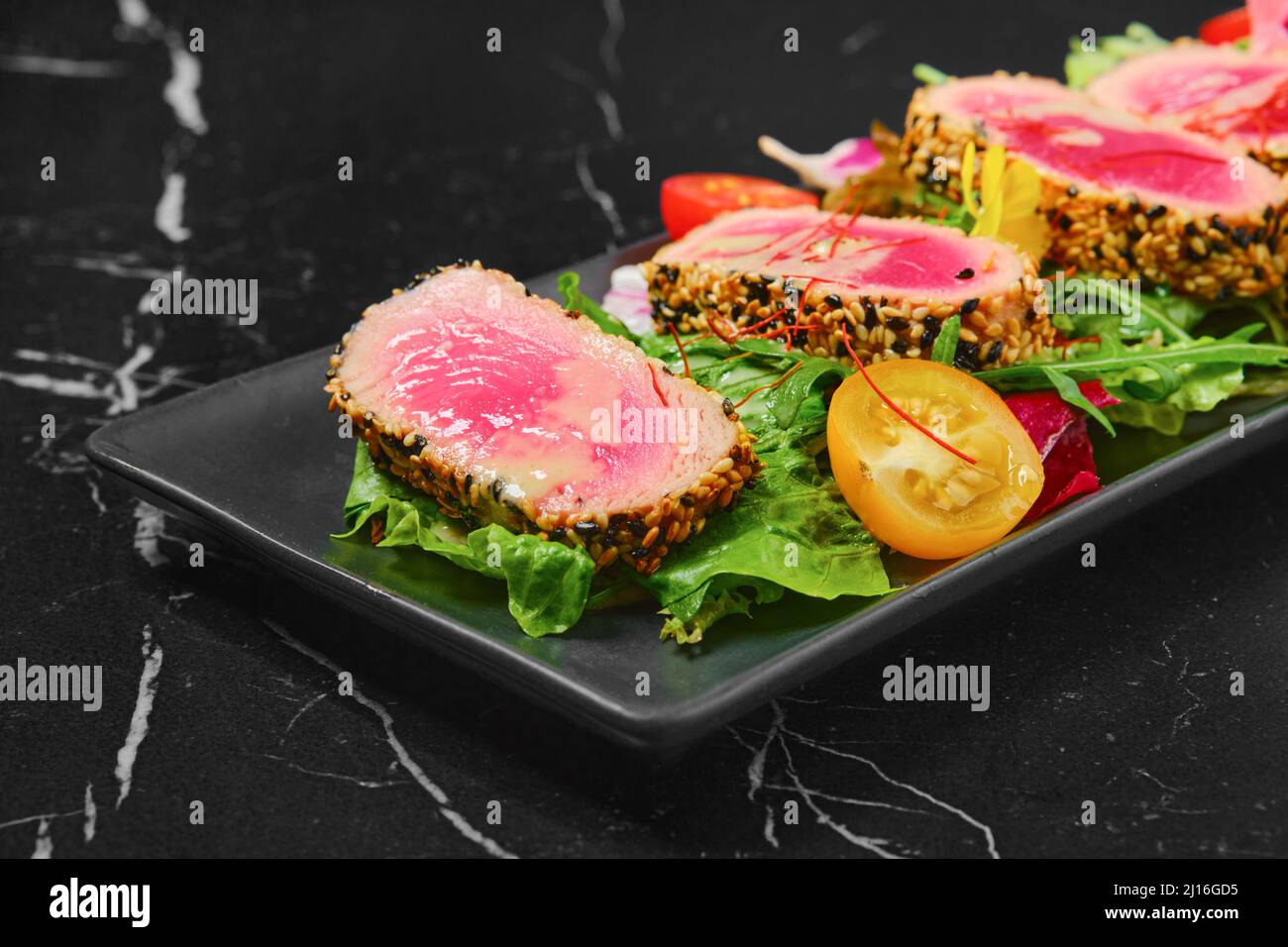 Grilled tuna steak in sesame breading with vegetables Stock Photo Alamy