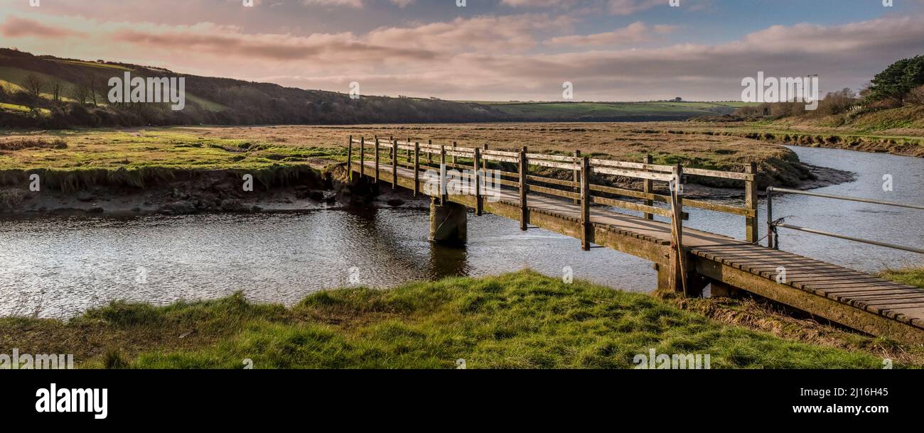 Walking over wooden footbridge hi-res stock photography and images - Alamy