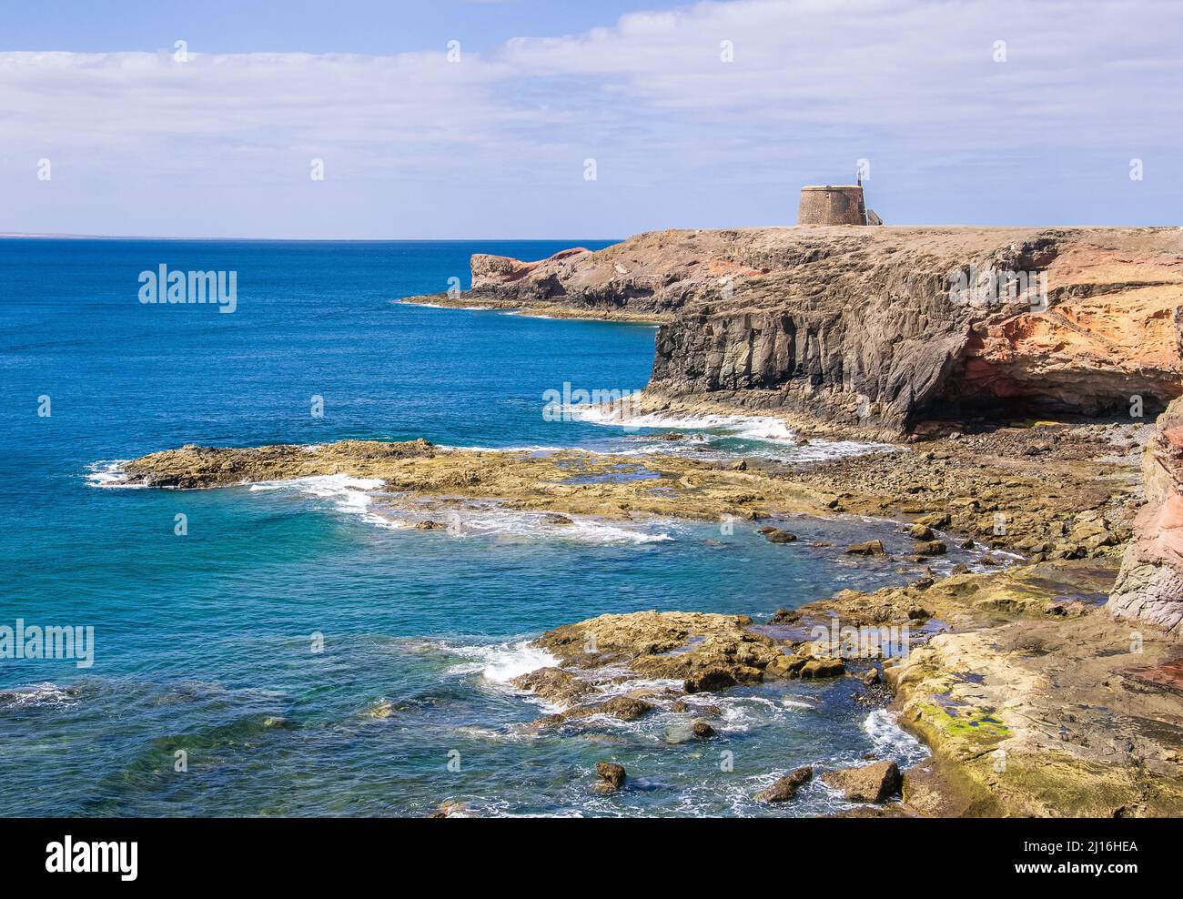 The beach underneath the headland where the Castillo del Aguilla is ...