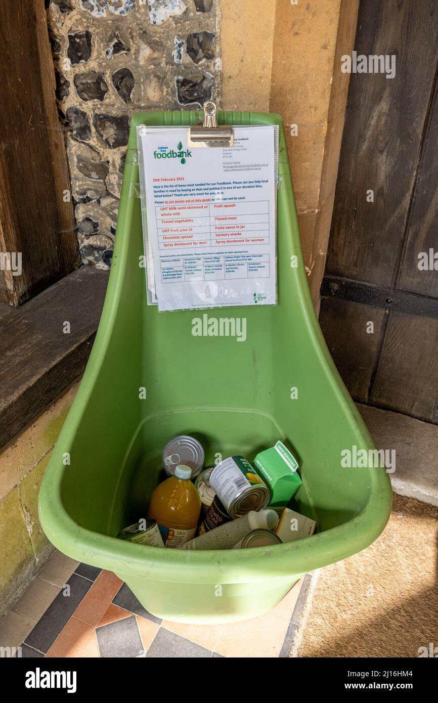 Donation bin for collecting food bank donations outside a church in Surrey, England, UK, 2022. Theme, financial difficulties, rising costs Stock Photo