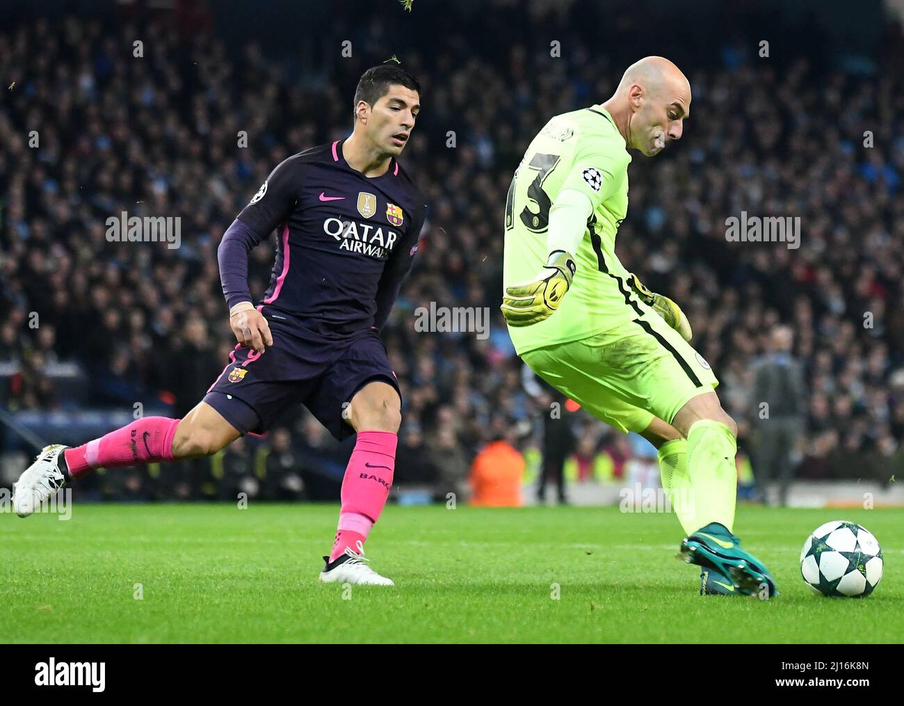 MANCHESTER, ENGLAND - NOVEMBER 1, 2016: Luis Suarez (L) of Barcelona and Willi Caballero (R) of City pictured in action during the UEFA Champions League Group C game between Manchester City and FC Barcelona at City of Manchester Stadium. Copyright: Cosmin Iftode/Picstaff Stock Photo